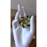 Broche couronne de fleurs