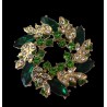 Broche couronne de fleurs