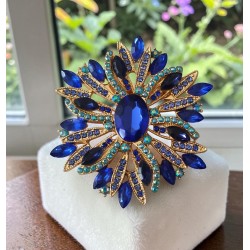 Broche fleur strass dorée bleu saphir ou ambre — grande