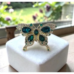 Broche papillon émail strass dorée — multicolore ou verte