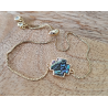 Bracelet doré avec pièce en nacre abalone