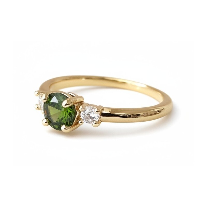 Bague solitaire verte zirconium – pierre centrale et brillants dorée