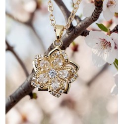 Pendentif fleur pivotante zircon cubique doré — 4 coloris