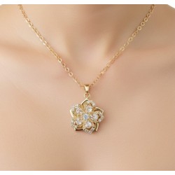 Pendentif fleur pivotante zircon cubique doré — 4 coloris